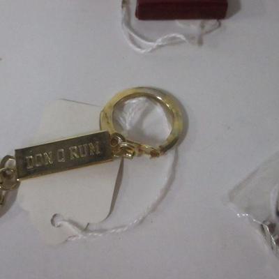 Lot 106 - Key Chains & Watches & Bands