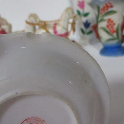Lot 108 - Porcelain Figurines 