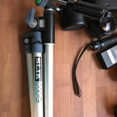 398:  Minolta Yashica and Polaroid Cameras with Accessories 