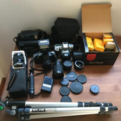 398:  Minolta Yashica and Polaroid Cameras with Accessories 