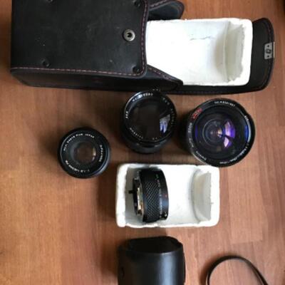 398:  Minolta Yashica and Polaroid Cameras with Accessories 