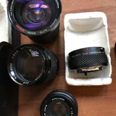 398:  Minolta Yashica and Polaroid Cameras with Accessories 