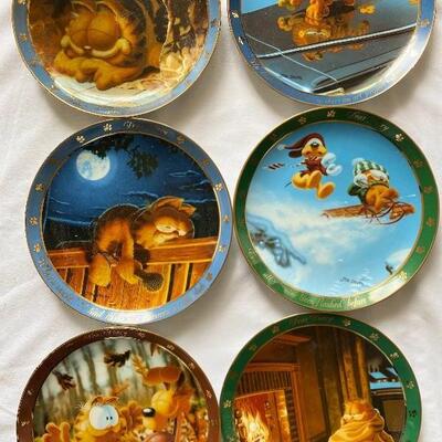 Six collectible Garfield plates 