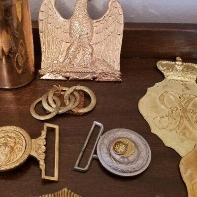 Lot #174  MILITARIA lot - Belt Buckles, badges, hat decorations, etc.