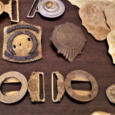 Lot #174  MILITARIA lot - Belt Buckles, badges, hat decorations, etc.