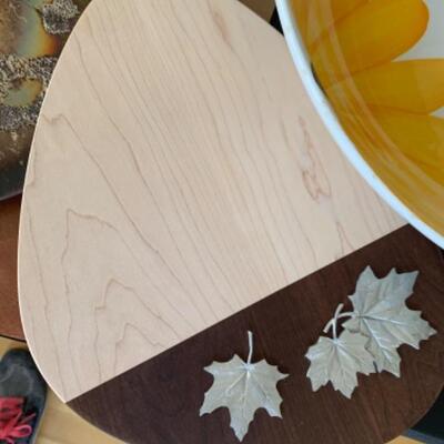 8. Assorted kitchenware (bowls, cutting boards, pizza stone, pewter, thermometer, crock pot, etc.)