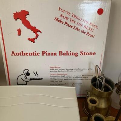 8. Assorted kitchenware (bowls, cutting boards, pizza stone, pewter, thermometer, crock pot, etc.)