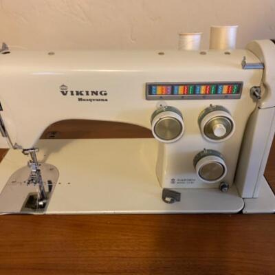 16. Viking Husqavarna sewing machine (6300-series) in walnut wood cabinet and chair
