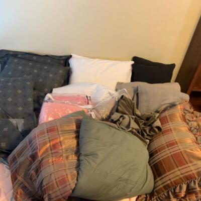 19. Bedding (two sets) of pillows, shams, duvet covers, comforters and blankets