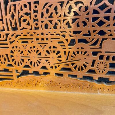 Scroll carved wood train  art with shelf