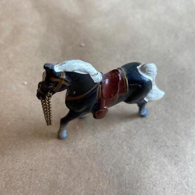 Miniature horse with  chain rein 