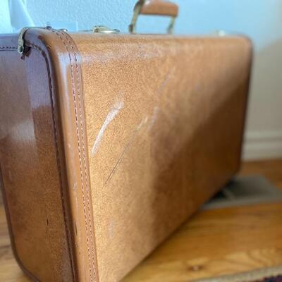 High gloss hard shell vintage suitcase
