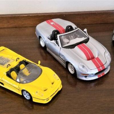 Lot #223  Lot of 3 die cast cars - 2 Durago, 1 Maisto