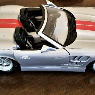 Lot #223  Lot of 3 die cast cars - 2 Durago, 1 Maisto