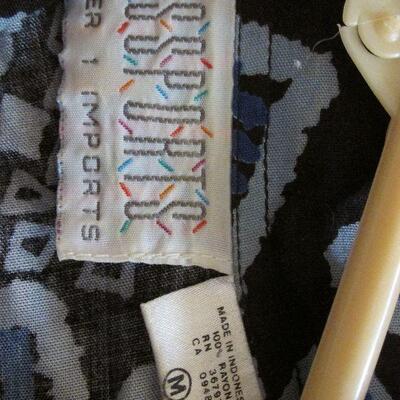 Lot 105- Passports from Pier 1 Shirt