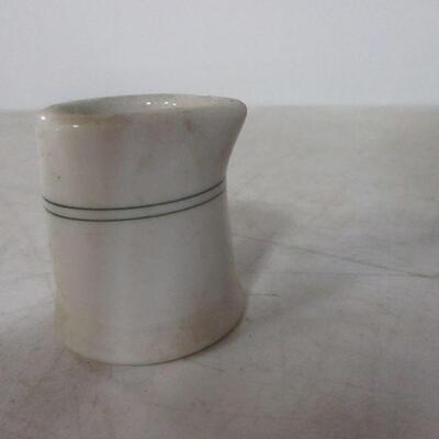 Lot 37 - BTC USA Pottery White Pitcher