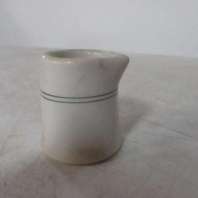 Lot 37 - BTC USA Pottery White Pitcher