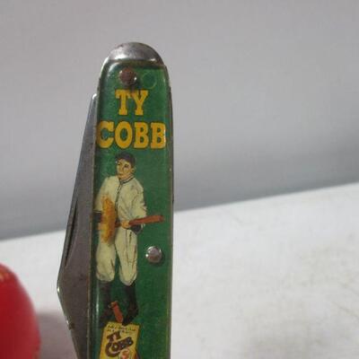 Lot 74 - Mark McGwire Baseball & Ty Cobb Pocket Knife