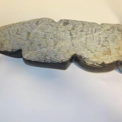 African carved serpentine stone sculpture of two people. Signed â€œH. Ncubeâ€  Likely from Zimbabwe.
