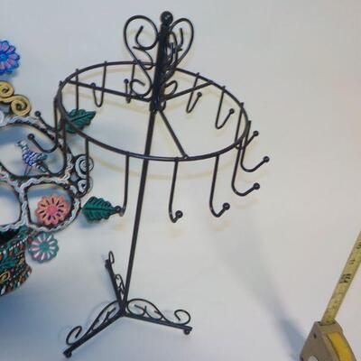 Mexican wall art with small basket; basket has drainage hold, so could be used as planter. Metal jewelry holder.