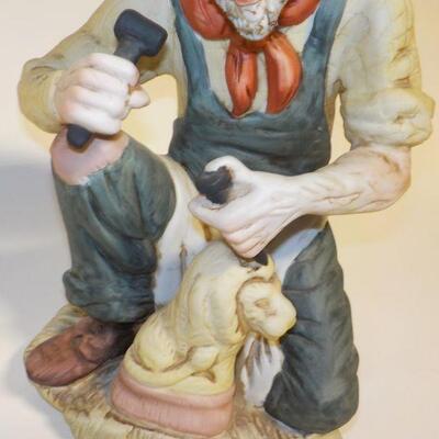 12 in. Sculpture figurine.