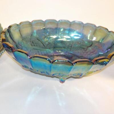 Vintage Blue Carnival Glass  blue iridescent carnival glass: footed candy dish with lid, two goblets, oval footed bowl with fruit on...