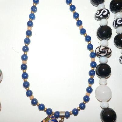New hand crafted necklaces w/ real and synthetic stones.