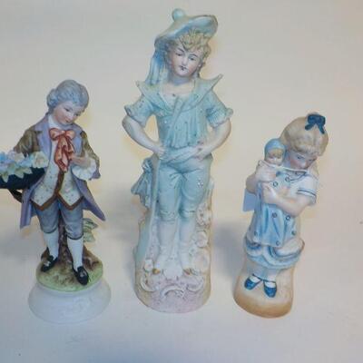 3 Hand crafted German figurines.