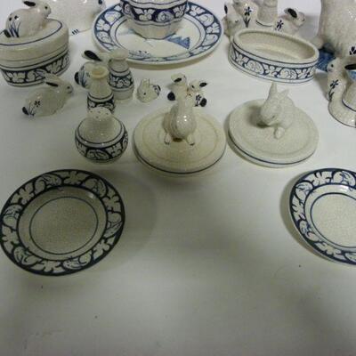 19 piece Rabbit design dinner ware.