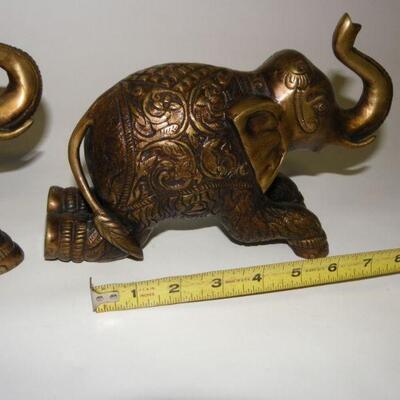 2- 9 inch Brass Elephants.