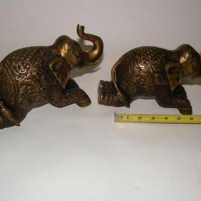 2- 9 inch Brass Elephants.