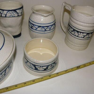 Lot of Dedham Pottery: Lot of five Dedham Pottery pieces: Covered round baking dish; straight-sided pitcher; rounded pitcher; boot-shape...