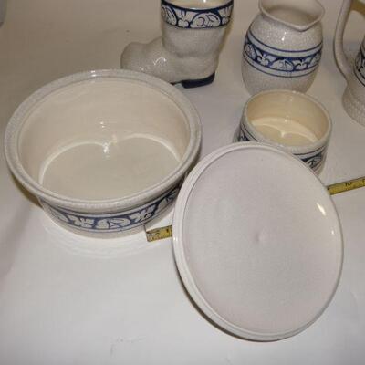 Lot of Dedham Pottery: Lot of five Dedham Pottery pieces: Covered round baking dish; straight-sided pitcher; rounded pitcher; boot-shape...