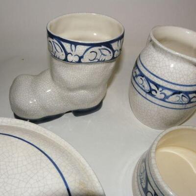 Lot of Dedham Pottery: Lot of five Dedham Pottery pieces: Covered round baking dish; straight-sided pitcher; rounded pitcher; boot-shape...