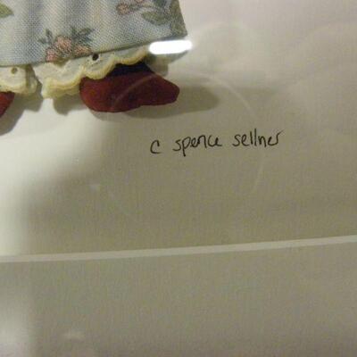 Black Art by C Spence Sellnes..Carol Spence Selner hand made and framed black doll with miniature doll. Signed in pencil lower right....