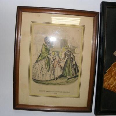 Lot of two pictures: Framed hand-colored page of Godeyâ€™s Americanized Paris Fashions, 1860; Framed fabric and ribbon art girl with a...