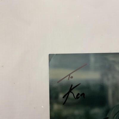 .37. Two John Berry Autographed 8x10s