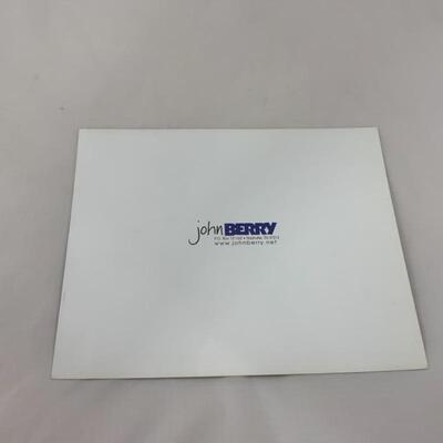 .37. Two John Berry Autographed 8x10s