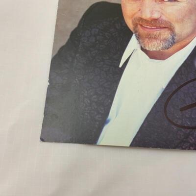 .37. Two John Berry Autographed 8x10s