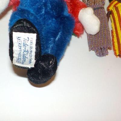 4 Goggywog and antique mini doll. 