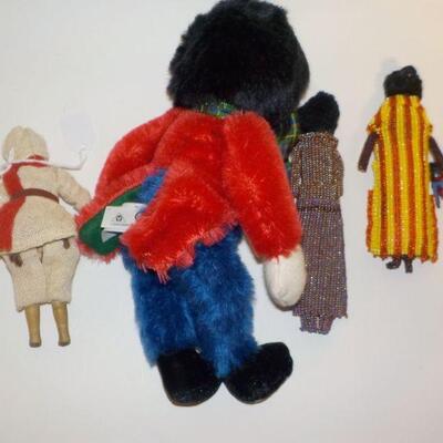 4 Goggywog and antique mini doll. 