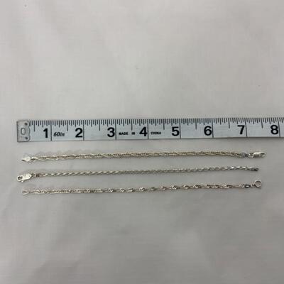 .67. Three Sterling Marked Bracelets