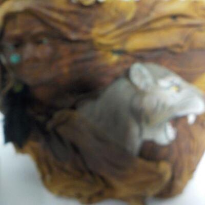 Patrick Seale signed Inuit totem, and sculpted, painted leather wall art of woman and bobcat head. 