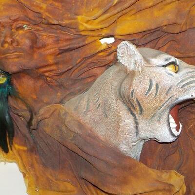 Patrick Seale signed Inuit totem, and sculpted, painted leather wall art of woman and bobcat head. 