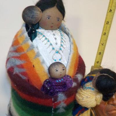 Real Native American mother and child doll and sculptured Chief Face.