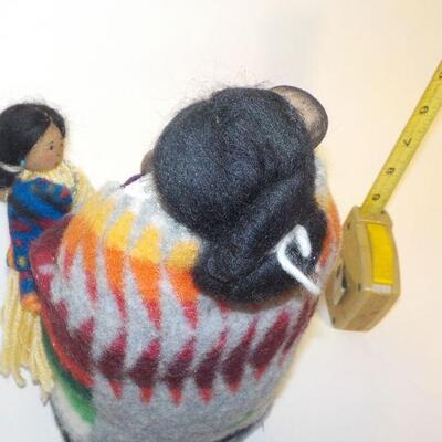 Real Native American mother and child doll and sculptured Chief Face.