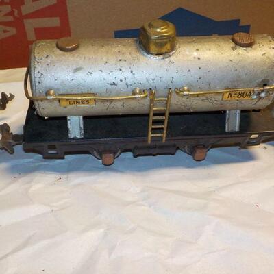 4- pre-war Lionel Trains....