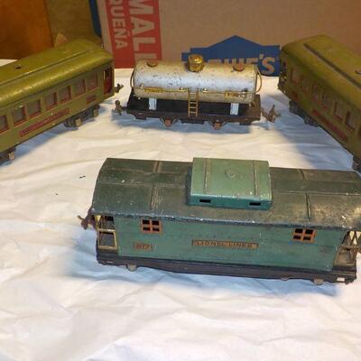 4- pre-war Lionel Trains....