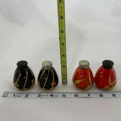 .125. Antique | Sterling Tops | Orange & Black Gilded Salt & Peppers