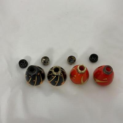 .125. Antique | Sterling Tops | Orange & Black Gilded Salt & Peppers